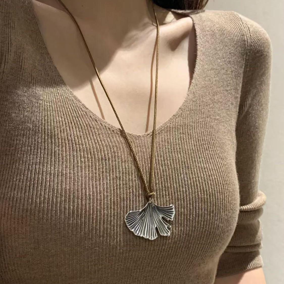 Korean Retro Star Tassel Necklace: Luxury Long Pendant for Sweaters