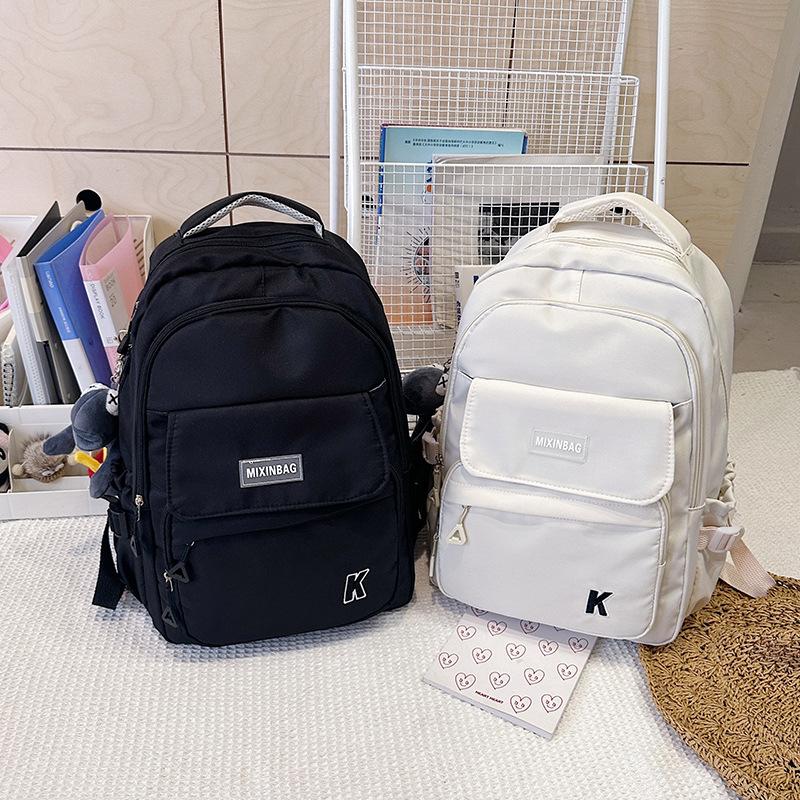 New large-capacity multi-compartment lightweight and versatile backpack fashionable junior high school high school student college backpack