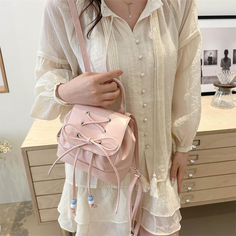 Ballet style bow backpack women 2025 new Internet celebrity portable small backpack go shopping travel small schoolbag