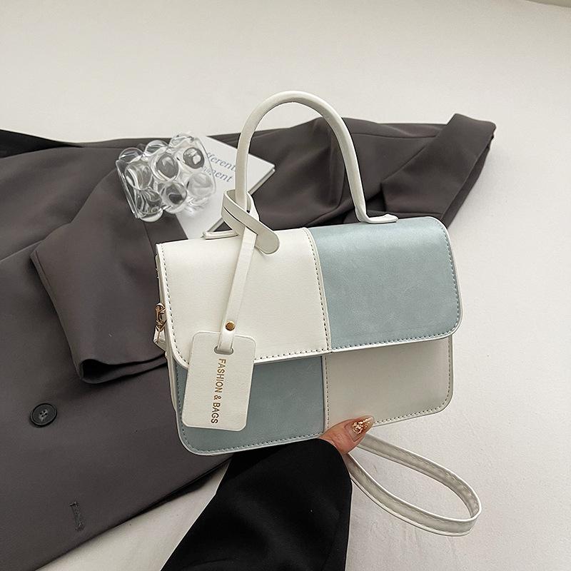 Spring fashion trend high-end sense light luxury shoulder messenger bag contrasting color design sense beautiful temperament handbag women's bag