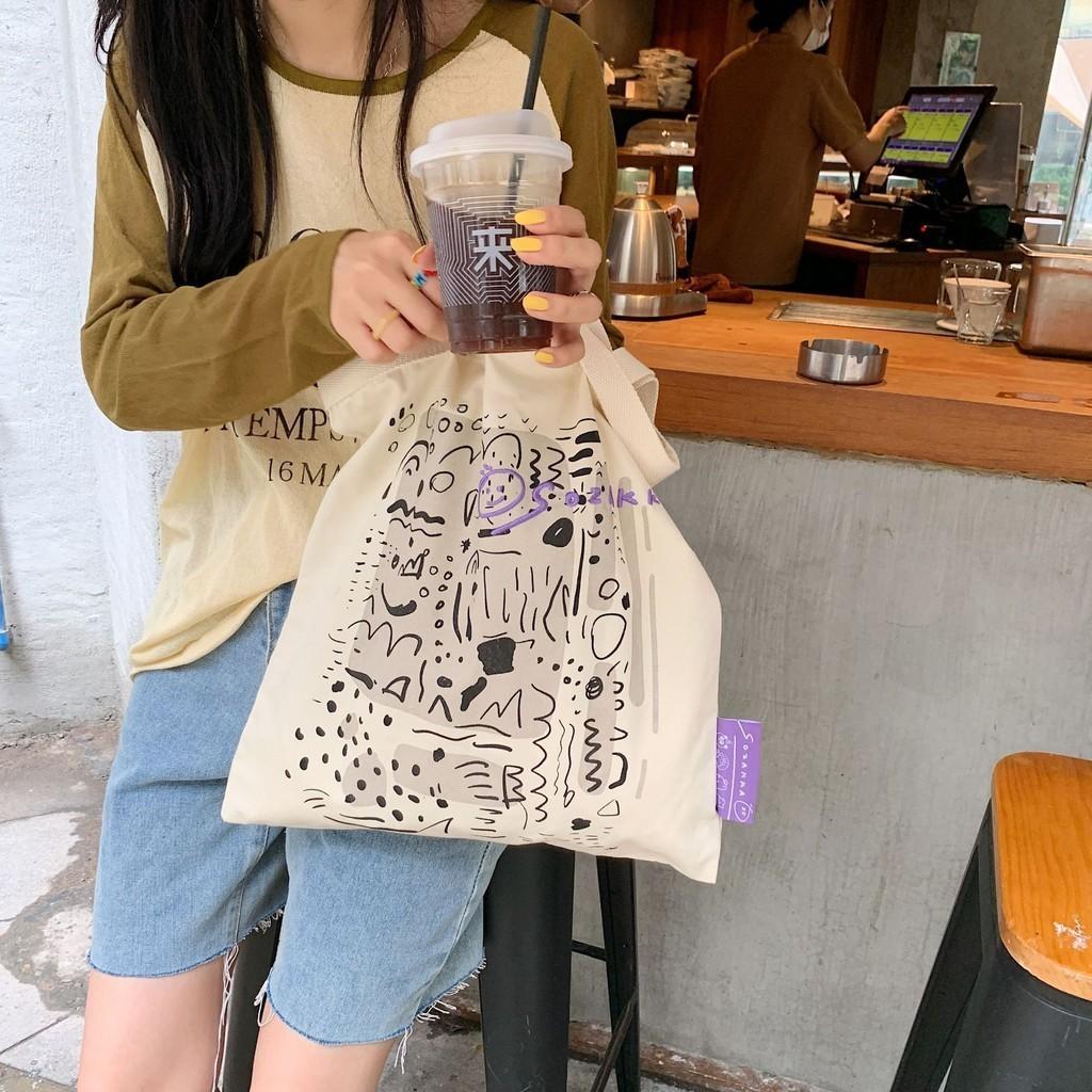 Stylish Canvas Tote Bag With Graffiti Print Large Capacity Shoulder Bag For Everyday Use