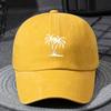 A Unisex Lightweight Fashionable Baseball Cap with a Coconut Tree Print Suitable for Boys and Girls in a Vintage Washed Style