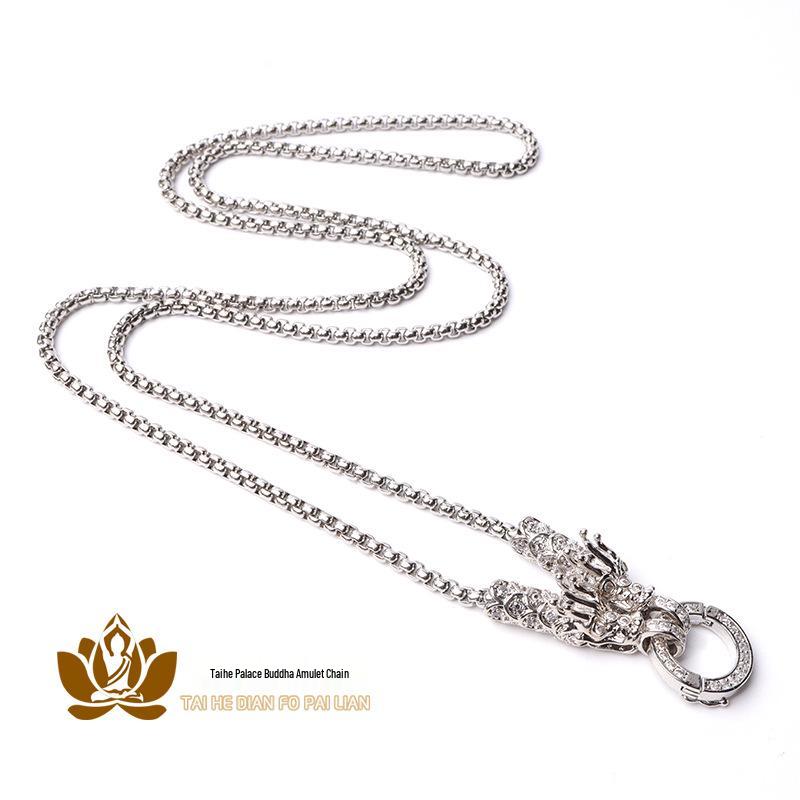 

Ожерелье-амулет в виде головы дракона с микропаве из бриллиантов с позолотой 18 карат - Унисекс Default