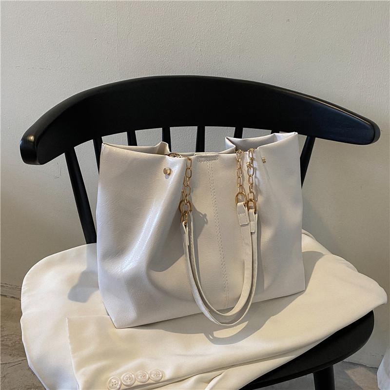 

Autumn and winter new large-capacity tote bag women s bag trendy Korean version texture student class bag shoulder handbag bag белый