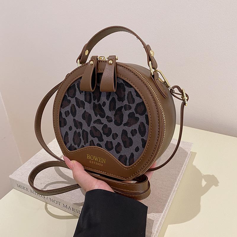 

Осінньо-зимова ручна ретро-сумка жіноча 2024 нова ніша мода леопардовий принт невелика кругла сумка елітна сумка-месенджер