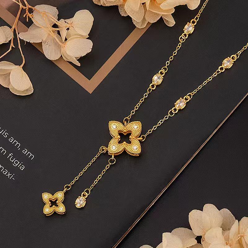 TikTok-Style Four-Leaf Clover Diamond Bracelet: Women's Luxurious Gold-Tone Titanium Steel Jewelry