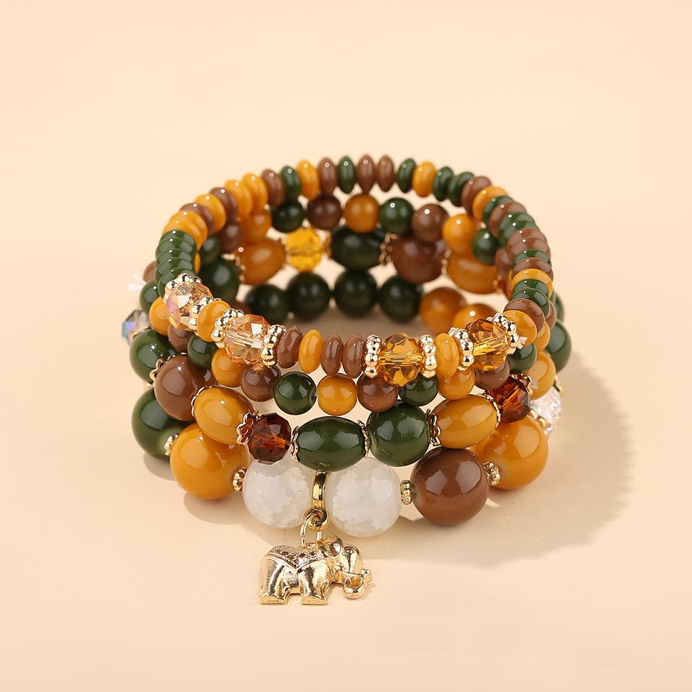Bohemian Ethnic Style Layered Beaded Bracelet Set with Elephant Pendant and Stackable Crystal Accents