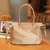 Simple and casual handbag tote bag, dumpling bag, women's briefcase, niche high-end large-capacity crossbody commuter bag