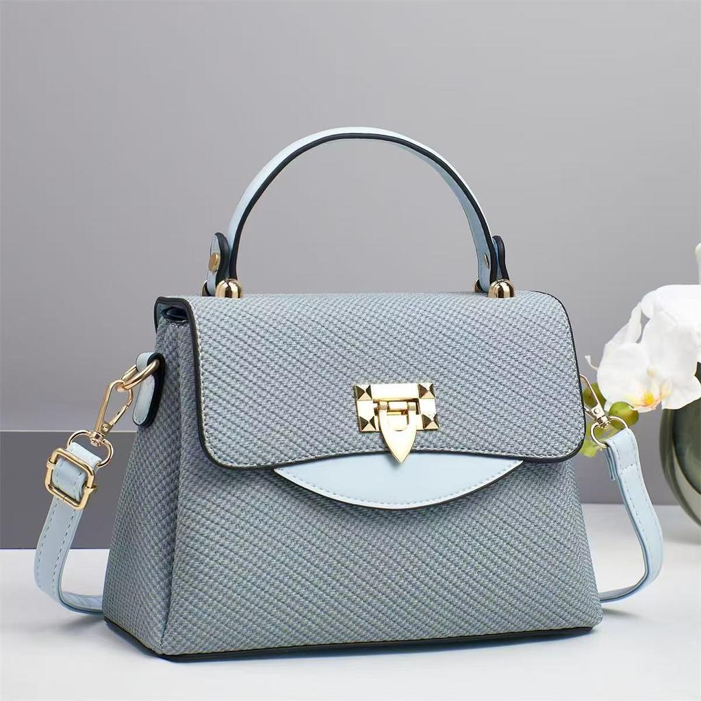 Neue leichte Luxus-Handtasche Pendler Macaron Schlicht Großes Fassungsvermögen Modisch Vielseitig Ein-Schulter Nische Umhängetasche