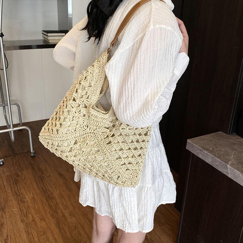 Niche Bag Women's Summer New Woven Hollow Shoulder Bag Casual Lazy Wind Tote Armpit Bag