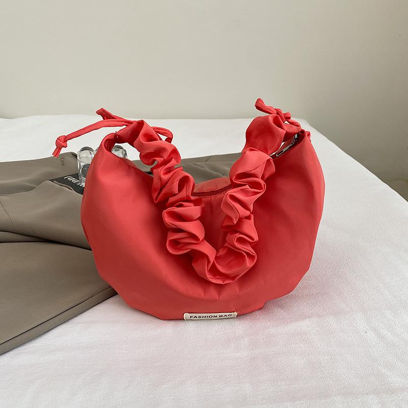 

Large-capacity commuter trendy tote bag 2025 new class student dumpling bag female versatile pleated messenger dumpling bag кавун червоний колір
