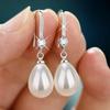 Exquisite Mode Silberfarbe Wasser Imitationsperlen Hängeohrringe für Damen Glänzende Rote Grüne Runde Ohrringe Schmuck Geschenk 2025