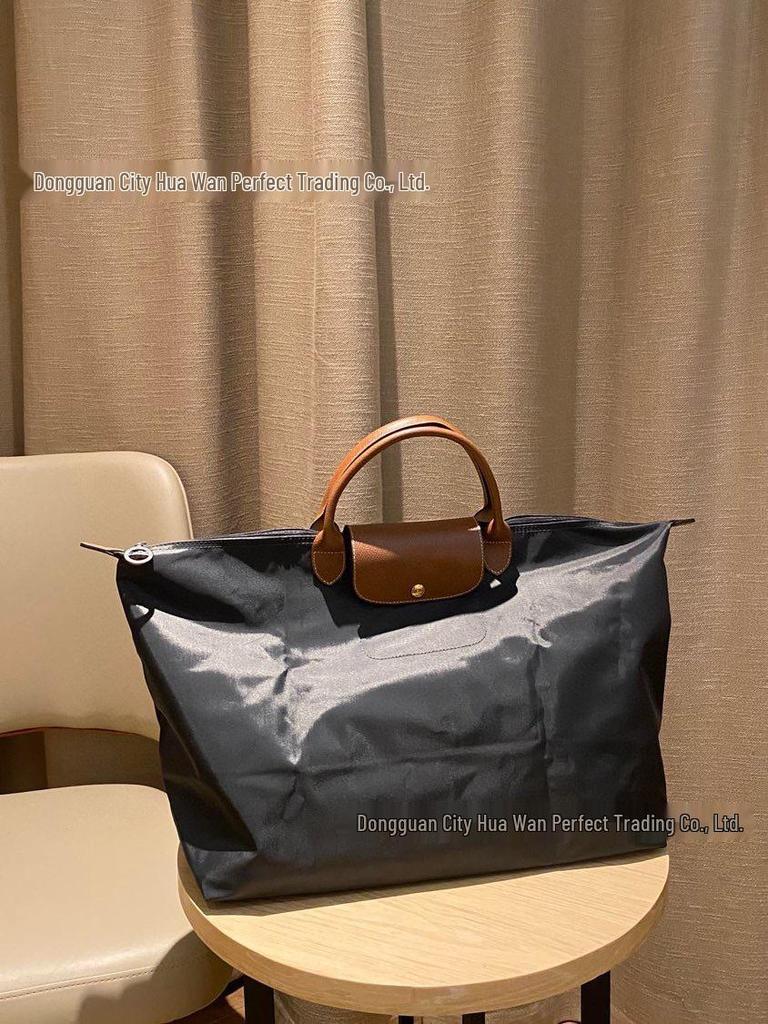 Xiangjia Large-Capacity Waterproof Oxford Travel Tote Bag, Lightweight and Foldable.