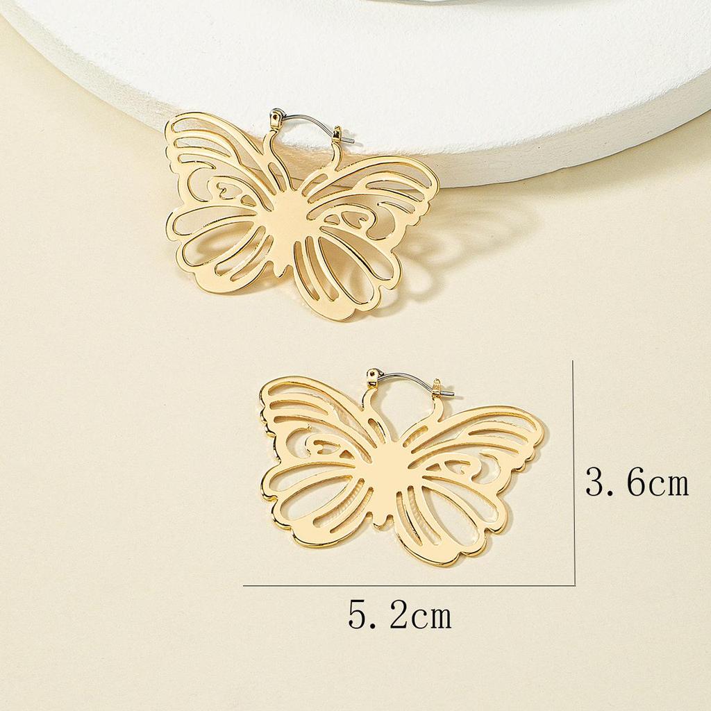 Elegant Hollow Butterfly Bowknot Earrings: High-End Metal Fashion for Women