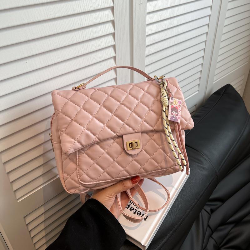 

Xiaoxiangfeng rhombus portable backpack bag 2025 new student class commuting schoolbag niche large-capacity backpack single bag