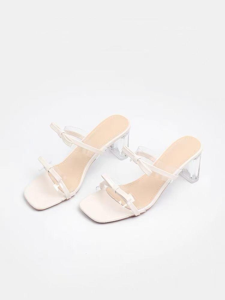 

2025 spring new bow open-toed cool slippers fashionable transparent crystal high-heeled half-slippers sweet pink women 42