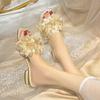 New celebrity niche flower fairy thick heel cool slippers female summer wear fashion out flat bottom one-word