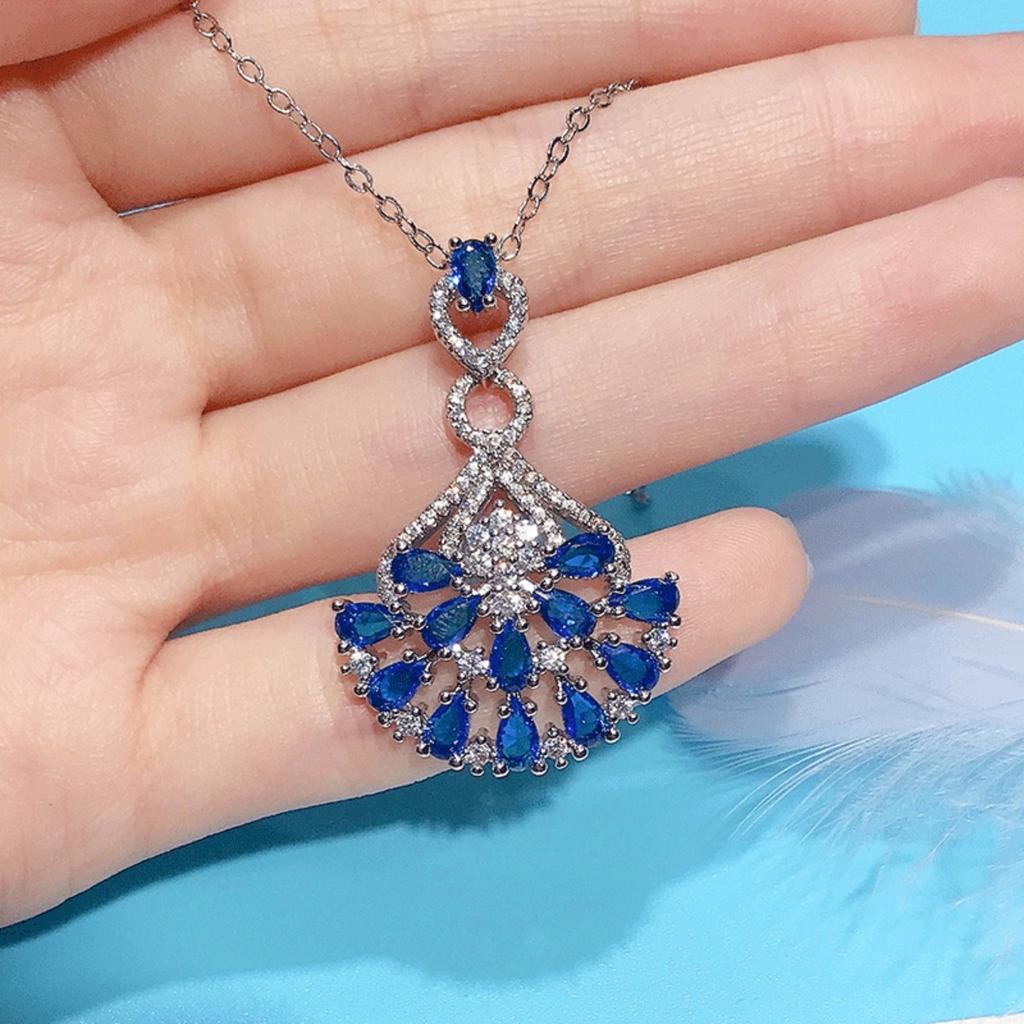 Fan Shaped Pendant Necklace with Deep Blue and Clear Stones Ornate Statement Jewelry for Women
