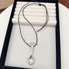 Wu Xin Silver Spoon Pendant Necklace - Niche Fun Black Rope Long Chain for Autumn/Winter Sweaters