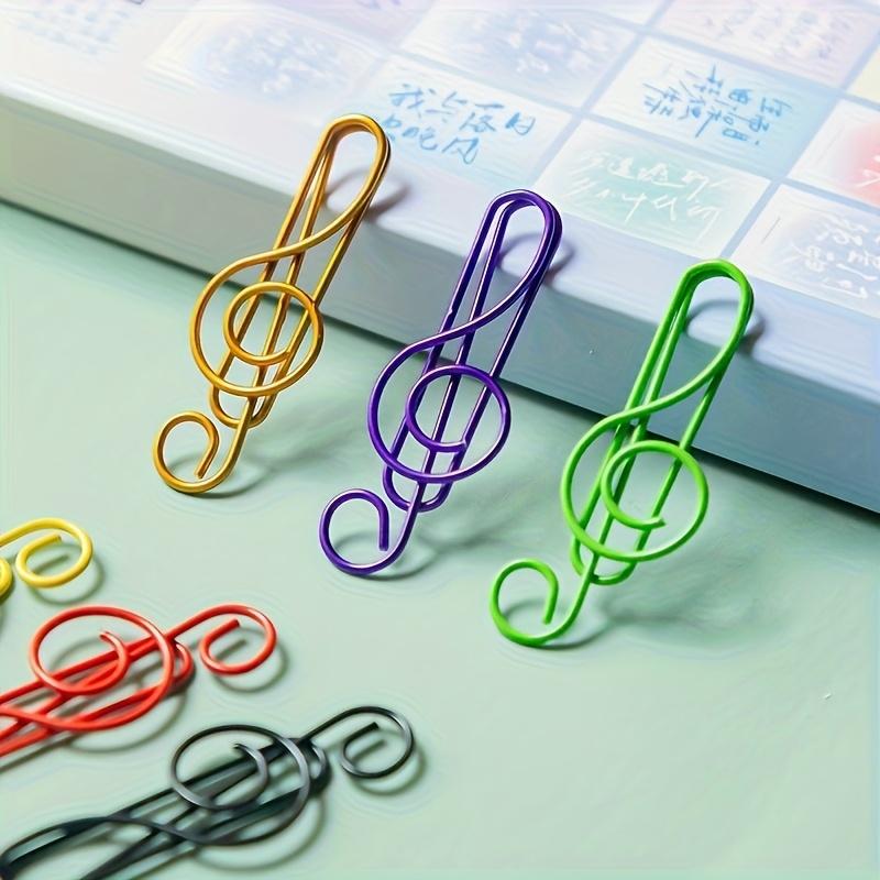 10 Color note shaped paper clips randomly selected