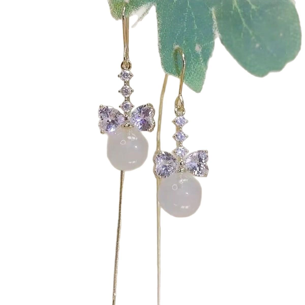 

Fresh opal, exquisite earrings, versatile design, high-end bow, sweet foreign earrings. белый