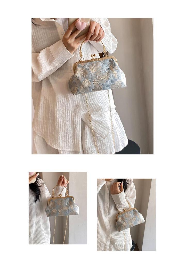 Elegante bestickte Umhängetasche mit Kettenverschluss