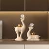 Decoración para el hogar
 – Estatuillas