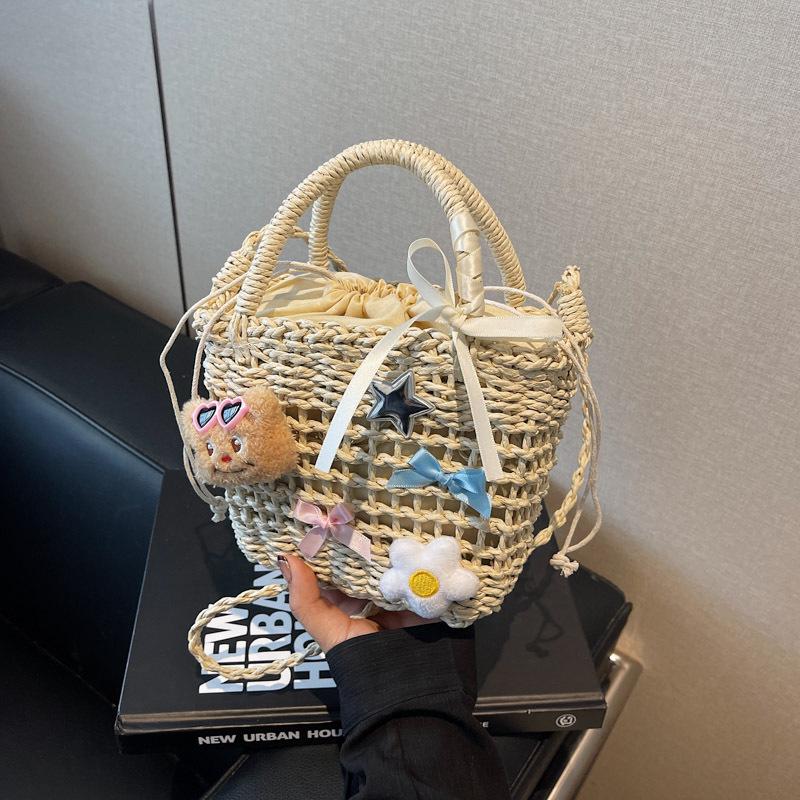 

Bucket bag women s new woven handbag shoulder messenger bag beach vacation straw bag tide