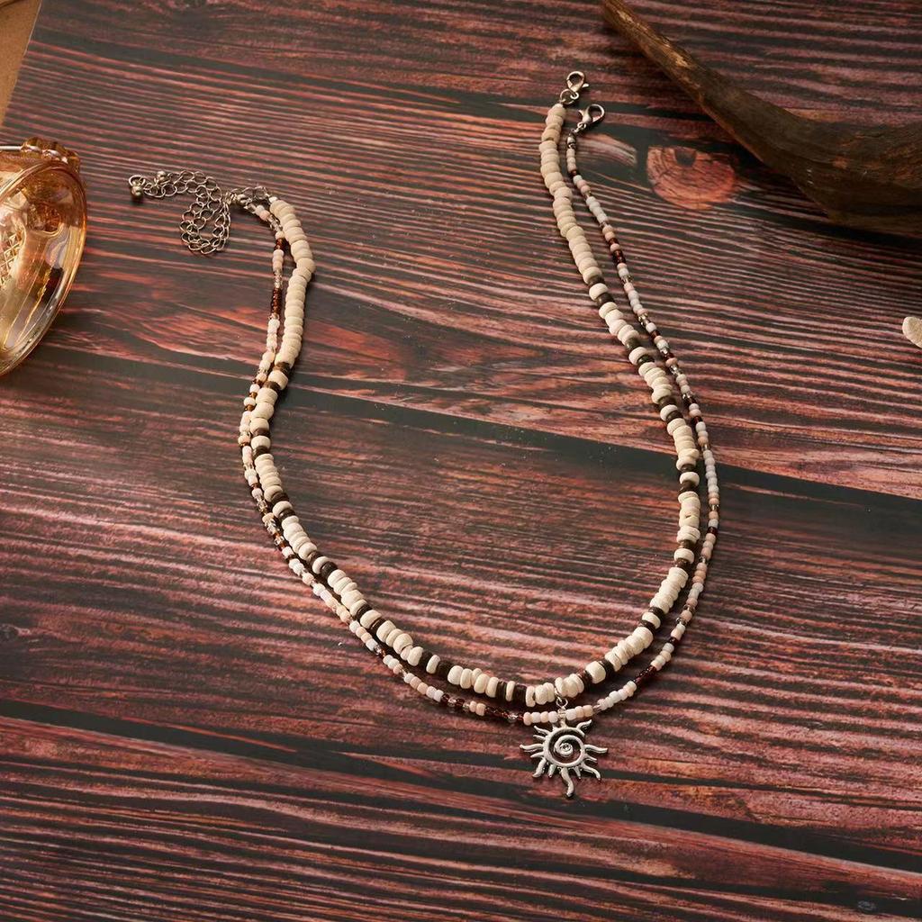 Stainless Steel Sun Pendant Coconut Shell Bead Necklace