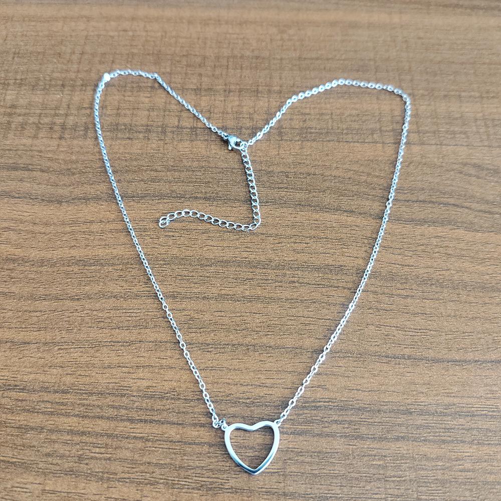 

18K Gold Mini Heart-Shaped Necklace for Women - Hollow Stainless Steel Charm