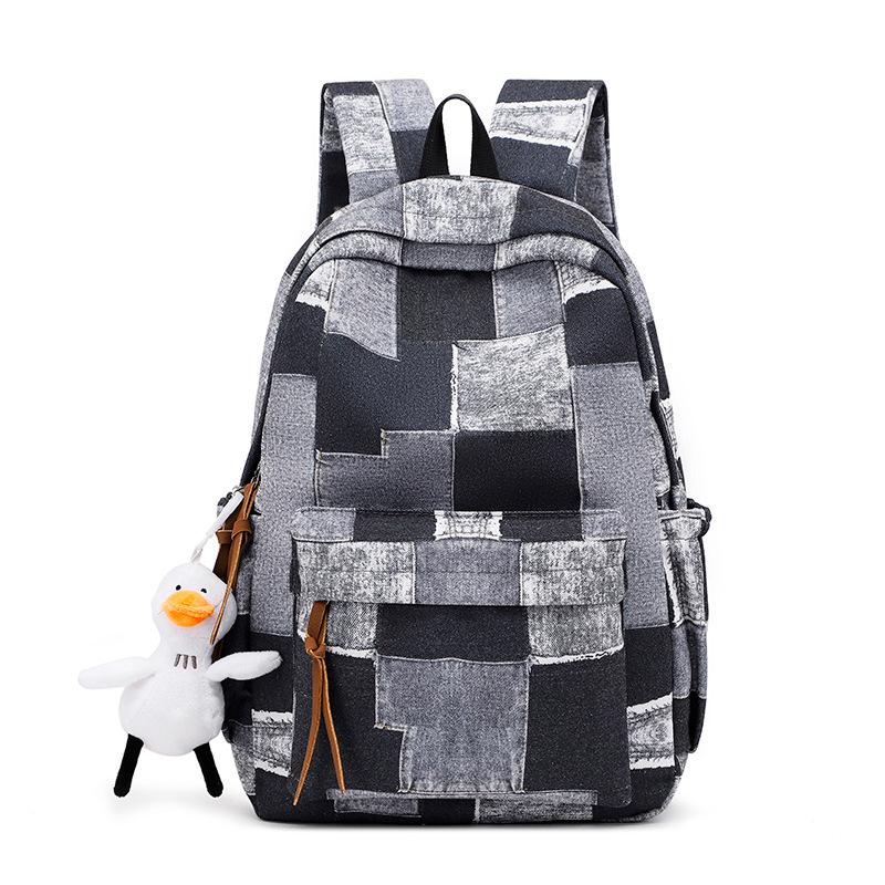 

New casual junior high and high school student schoolbag backpack men s simple large capacity travel simple trend backpack women 28*14*42