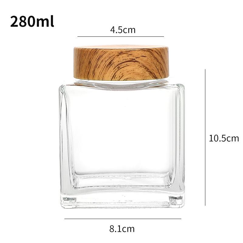 Verdickte flache quadratische Glasflasche mit Holzmaserung für Honig oder Marmelade