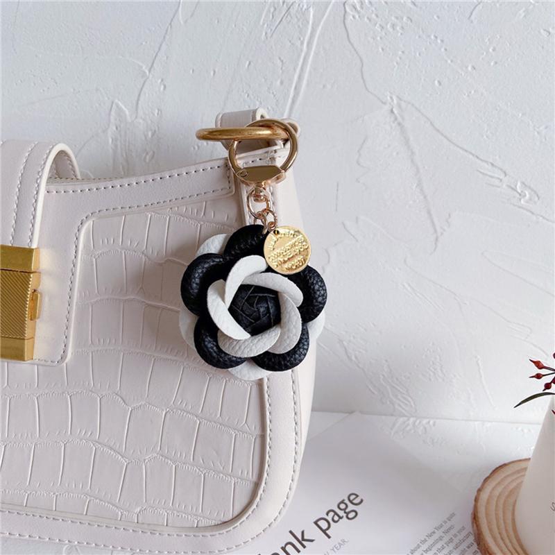 Yogodlns Cute Sweet Synthetic PU Leather Rose Camellia Flowers Bag Pendant For Women Trinket Key Chains Ring Car Bag Charm