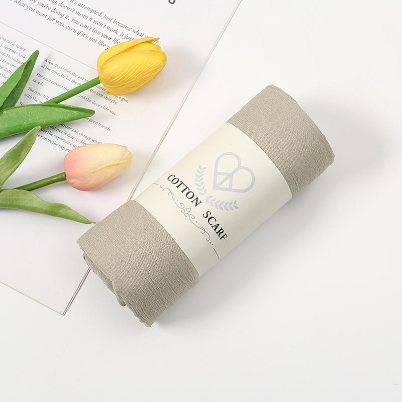 Autumn and winter new micro-elastic crumpled cotton blended long towel right angle lock edge polyester headscarf hot-selling solid color scarf