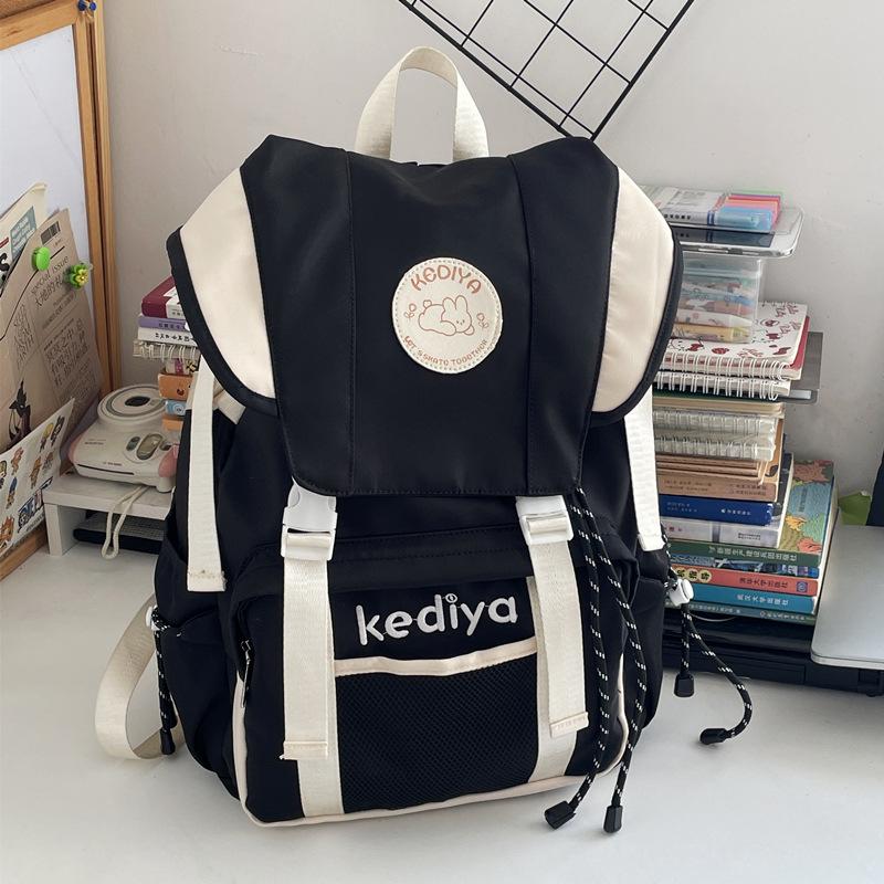 Large capacity backpack, new college student schoolbag, leisure travel nylon backpack.