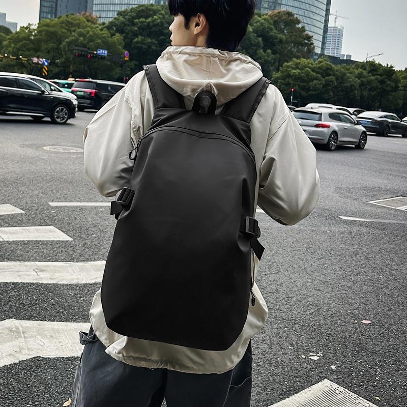 School bag for male high school students, simple and versatile computer travel bag, light casual backpack, large-capacity college student backpack.