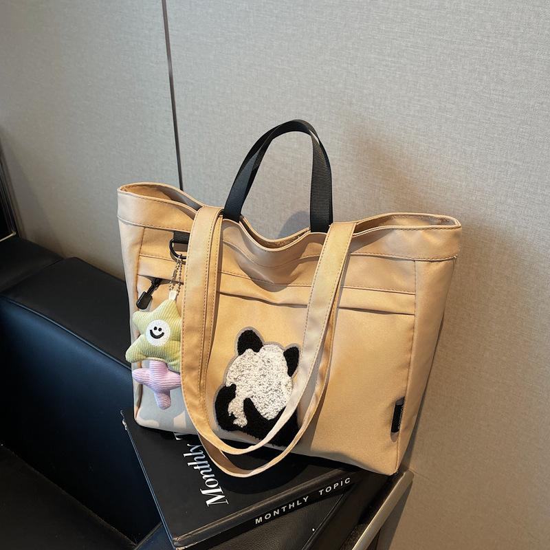 Casual large-capacity shoulder bag women's new fashion handheld cloth bag versatile class tote bag