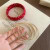 2025 Autumn/Winter French Retro Polka Dot Metal Bangle: Luxurious Fabric Jewelry