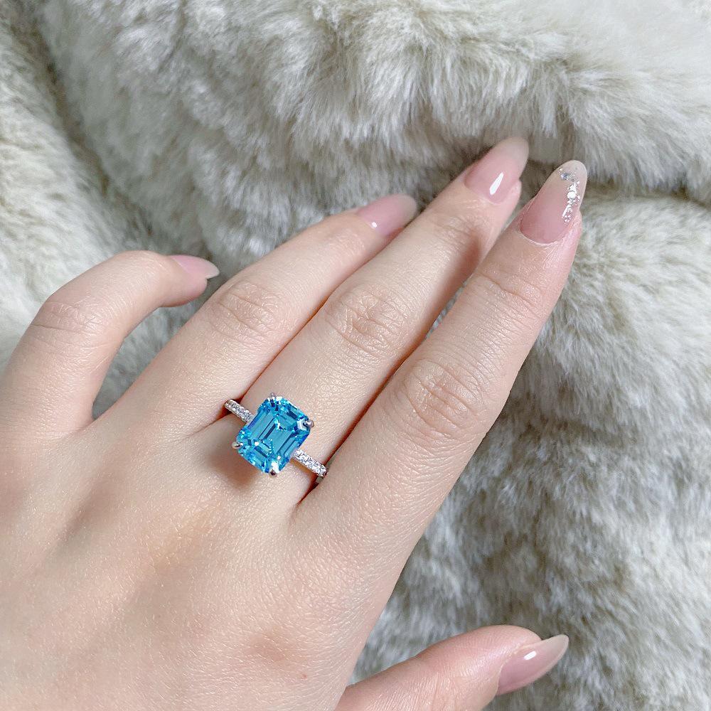 Aquamarine Emerald-Cut Ring In 925 Sterling Silver with Pave Diamonds, Plated In PT950 Gold.