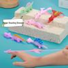 Dinosaur Finger Dart Toy: Launchable Soft Rubber Dinosaur for Stress Relief and Entertainment