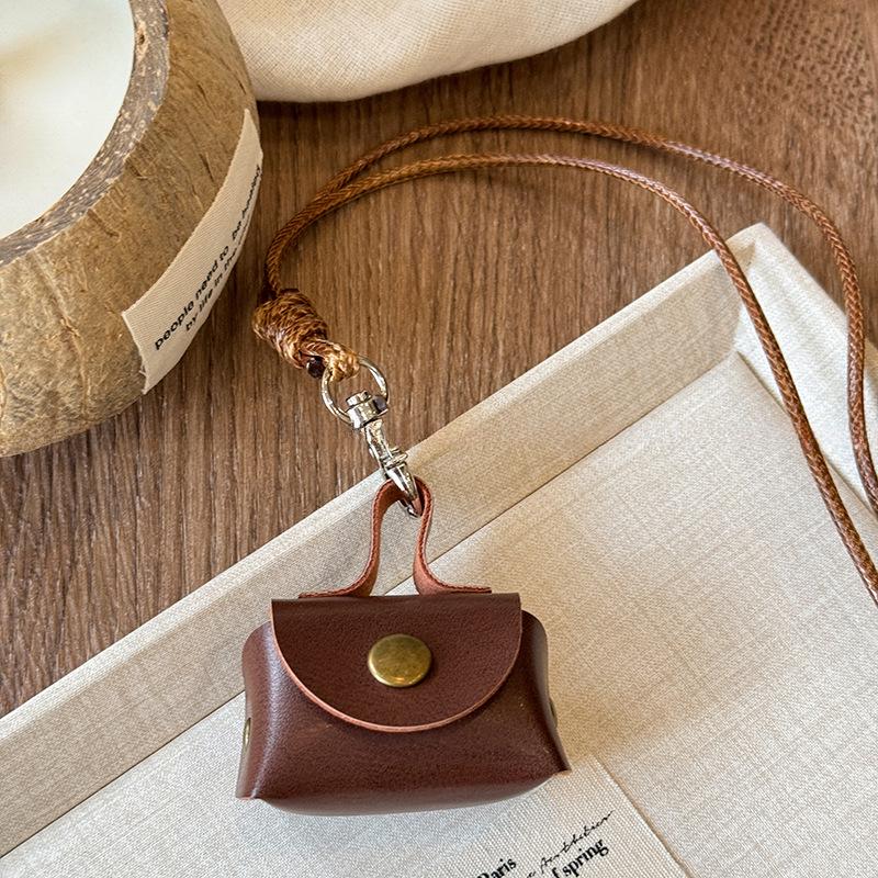 Retro Leather Coin & Earphone Pouch Necklace - Versatile Commuting Sweater Chain, High-End Jewelry.