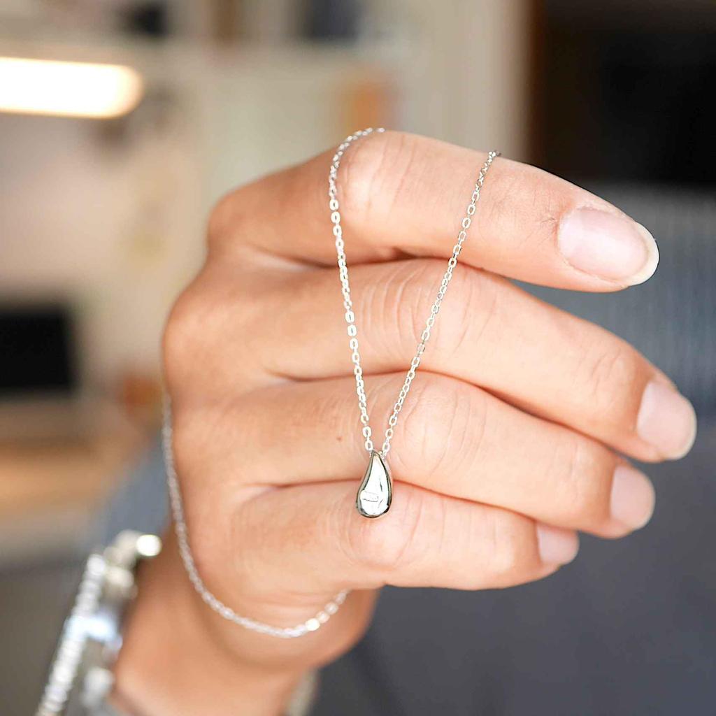 This Genuine 925 Sterling Silver 18K Teardrop Charm Necklace Features a Minimalist Design and a Small It Comes with a Drawstring Pouch and Is a