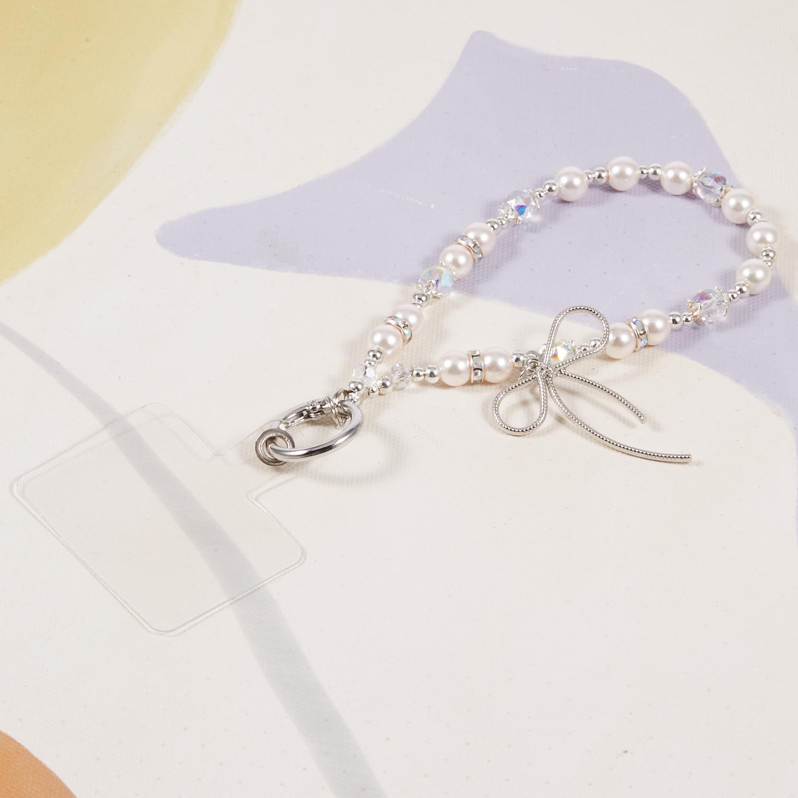 

Cell Phone Charm Lanyard 26cm Bowknot Alloy Beads Phone Case Wrist Strap for Women Girls Beige