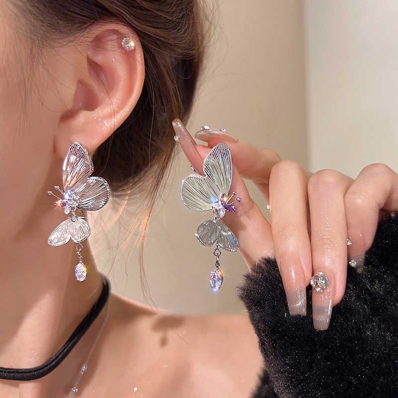 

Серьги-пусеты «Ажурные бабочки» с фиолетовым цирконом для женщин - Новый стильный дизайн высокого класса 2024