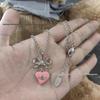 Empress Cixi Pink Bow Lacquered Saturn Necklace: Luxurious Punk-Style Clavicle Chain for Women