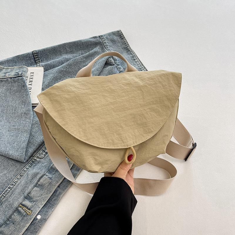 Crossbody bag new men's and women's sports crossbody bag flip cycling small backpack fashionable solid color breast bag