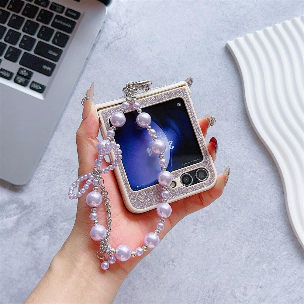 Cover in pelle a reticolo glitterato con fiocco e bracciale a catena da polso con perle per Samsung Galaxy Z Flip 6 5 4 3 Custodia per telefono