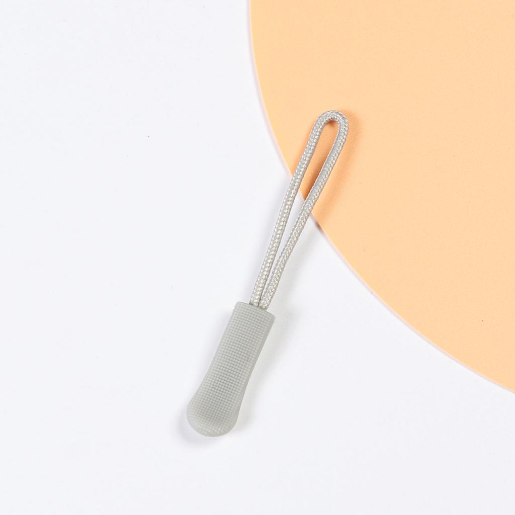 Gekleurd TPU-accessoire met rupsvormig ritssluitingkoord