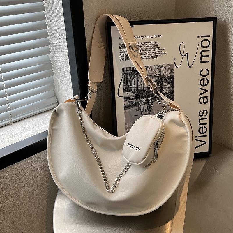 

Сумка большой вместимости женская осенне-зимняя универсальная 2025 новая на плечо сумка-мессенджер красная холщовая сумка нишевая сумка-пельмень бежевый