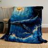 A golden-accented whale swimming in swirling blue waves under a gold sun. for all seasons blanket lunch break throw gift